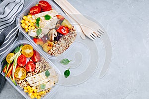 Meal prep l containers with quinoa, grilled and fresh vegetables and chicken