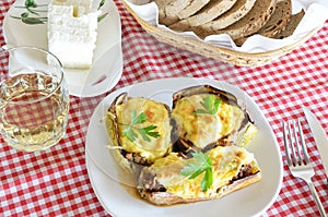 Meal with stuffed eggplants