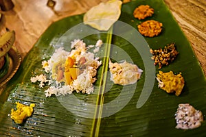 Meals served on banana leaf, traditional south indian cuisine