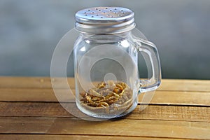 Mealworms in a pepper shaker jar