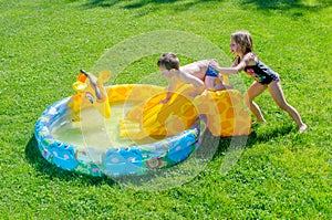 Mean sister and brother in pool