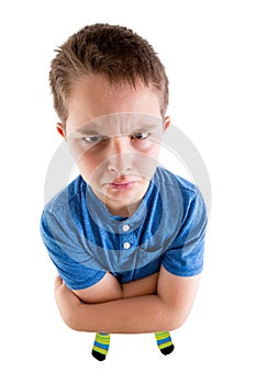 Mean Young Boy Looking at High Angled Camera photo