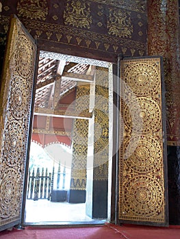 Meaningful buddhism arts decorative ornaments inside temple doors WAT XIENG THONG