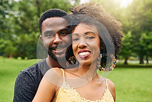 She means the world to me. Cropped portrait of an affectionate young couple spending some time together in the park.