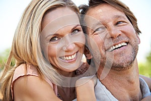 He means the world to me. a happy mature couple enjoying a day outdoors.