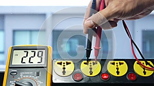 Measure the AC voltage of 230 Volts from the power outlet with a digital meter.