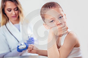 Measure child glucose level blood test diabetes little boy