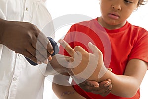 Measure child glucose level blood test diabetes little boy using