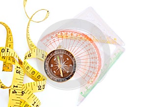 Measure Tape, Compass, ruler on white background