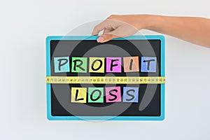 Measure your profit and your losses concept