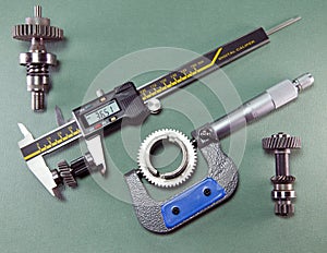 Measurement of the details by a digital caliper and a mechanical micrometer