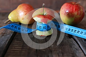 Measurement red bitten apple