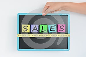 Measurement of sales concept on blackboard