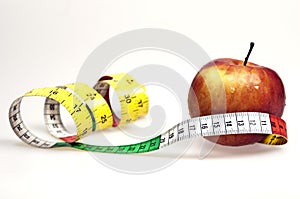 Measurement tape and apple