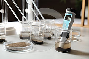 Measuring acidity and pH of soil. Laboratory analysis