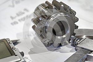 Measuring gears with a caliper in production, high-precision machining