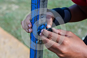 Measuring the high jump athletics with nice background