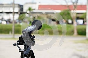 Measuring the noise on the road with a sound level meter.