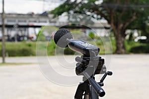 Measuring the noise on the road with a sound level meter.