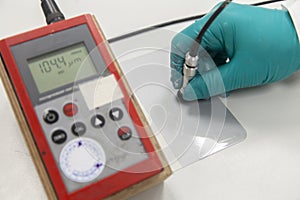 Measuring paint film thickness