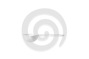 White measuring spoons isolated on a while background