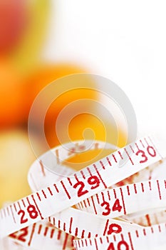 Measuring tape with different fruits