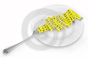 Measuring tape on a fork and knife - dieting concept image