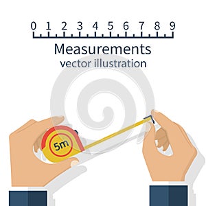 Measuring tape in hand photo