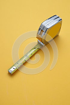 Measuring tape ,measuring tape on yellow background