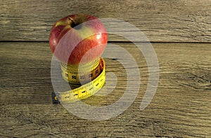 Measuring tape wrapped around an apple