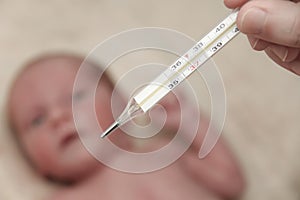 Measuring the temperature of baby in thermometer
