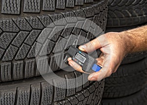 Measuring the tread depth of a tire