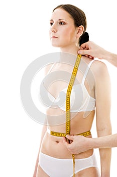 Measuring woman's breat waist lenght photo