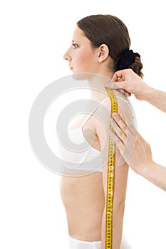 Measuring woman's shoulder length