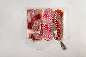 Meat assorti in packaging photo