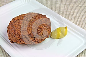 Meat Ball with Mustard on Paper Plate