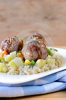 Meat balls and couscous