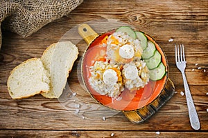 Meat balls with rice, hedgehogs with carrots, orange plate