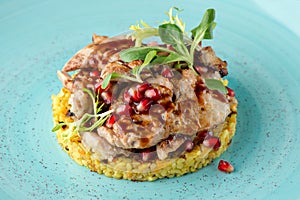 Meat with bulgur, pomegranate and fresh verdure