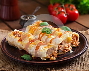 Meat cannelloni sauce bechamel.