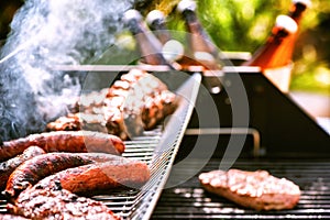 Meat cooking on barbecue grill for summer outdoor party. Food ba