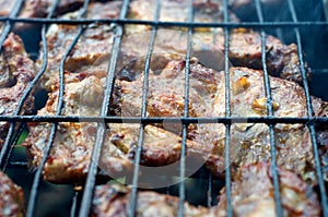 Meat cooking on grill
