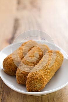 Meat croquete on dish