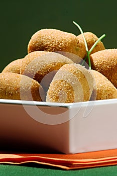 meat croquette in white bowl