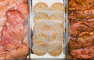 Meat in cutlets on the counter in the market. Semifinished