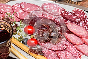 Meat delicatessen plate. meat-cutting