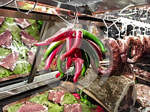 Meat Department in the butcher shop inside the restaurant. Various types of meat are presented in an orderly and creative way.