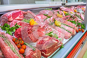 Meat department, showcase with variety of meat in different cuts