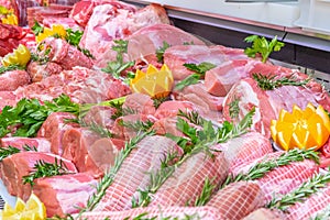 Meat department, showcase with variety of meat in different cuts