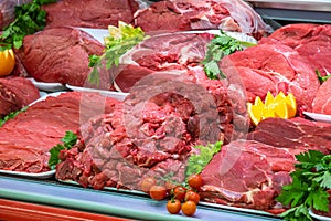 Meat department, showcase with variety of meat in different cuts